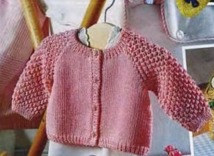 Оригинальная кофточка для девочки спицами