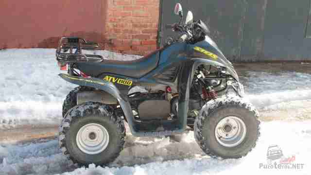 Детский Stels ATV 110D у гаражей