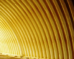 Ангар, утепленный изнутри напыленным ППУ Ангар, утепленный изнутри напыленным ППУ